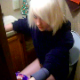 A pretty blonde girl has some bad gas while sitting on a toilet. She seems to be trying to take a shit, but we are not sure if she is successful. You can hear some good farts, but audio quality is not top notch.